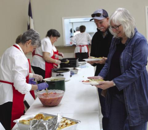Guests of the annual Clifton Civic Improvement Society’s turkey dinner walk through the serving line on Thursday afternoon, November 2. Nathan Diebenow | The Clifton Record