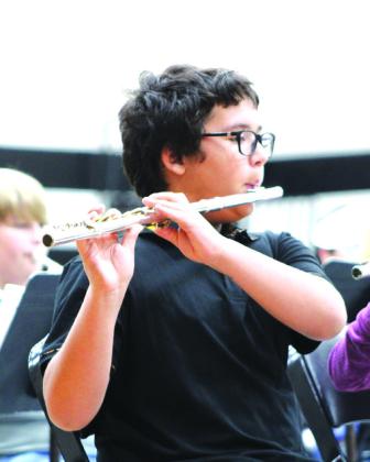 A.J. Villarreal and Tyler Hinson (from left) performed during the Meridian Independent School District's all-band concert on Thursday, February 22, in the Meridian High School gymnasium. Nathan Diebenow | Meridian Tribune