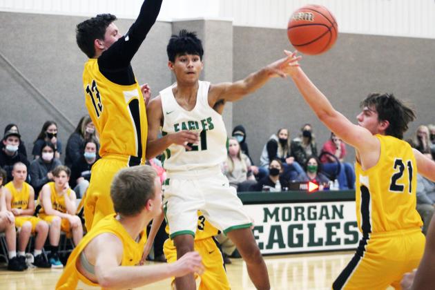 Forrest Murphy/Clifton Record/Morgan's Javier Guajardo (21) and the Eagles defeated the Iredell Dragons, 87-53 Tuesday.