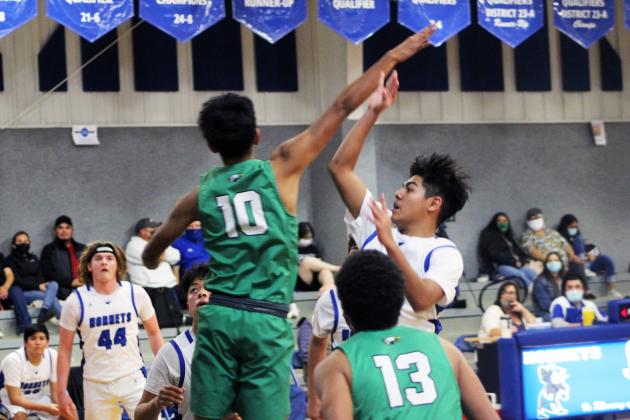 Forrest Murphy/Clifton Record/Walnut Springs' Diego Muniz (1) put up a team-high 20 points in his team's 50-42 win over the Covington Owls Tuesday night.