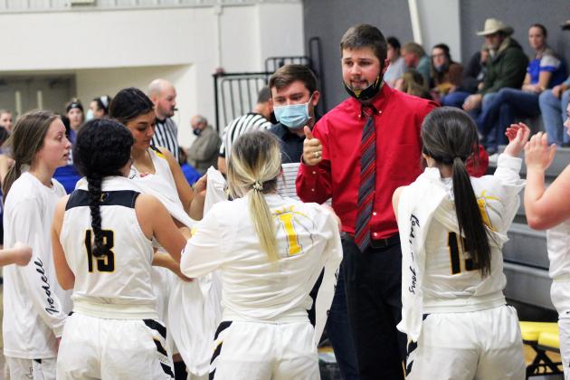 Forrest Murphy/Meridian Tribune/Iredell Head Girls’ Basketball Coach Jarred Shaffer, second from right, spoke about his playing days, as well as his time leading the Lady Dragons in a recent interview.