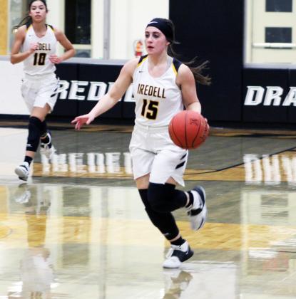 Forrest Murphy/Meridian Tribune/Iredell’s Sage Potter and the Lady Dragons came away with a 65-52 win over the Morgan Lady Eagles Friday night.