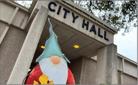 One of a pair of gnomes standing proud in flower pots outside Clifton City Hall welcomes city residents to file for a place on the ballot and run for Clifton City Council and Clifton mayor in the coming May election. Nathan Diebenow | The Clifton Record