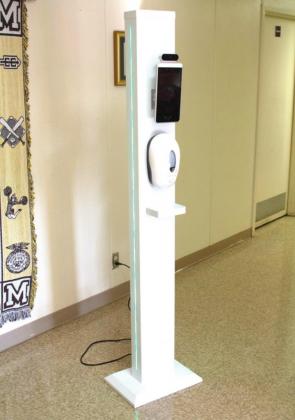 A new temperature scanner is showcased Tuesday at Meridian ISD that the school will be using on students before they can enter the campus building. Allen D. Fisher | Meridian Tribune