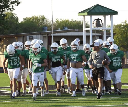 Head football coach Brent Finney leads the pack of Cubs onto the field during the scrimmage against Whitney Friday night at Cub Stadium. Photo Courtesy of Brett Voss’ The Sports Buzz