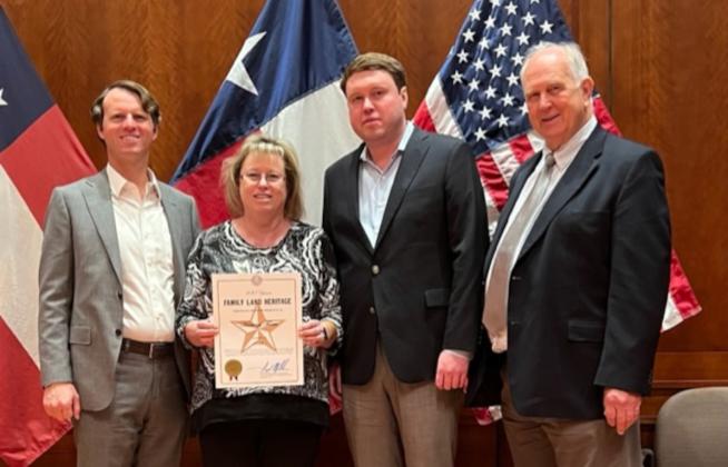 The descendents of N.T. “Nere” Hastings were recently honored by the Texas Department of Agriculture’s Family Land Heritage program for having their farm in their family for over 100 years. Pictured are John Hastings III, Mary Hastings, William Hastings, and John Albert Hastings, Jr. Courtesy Photo By Hastings Family