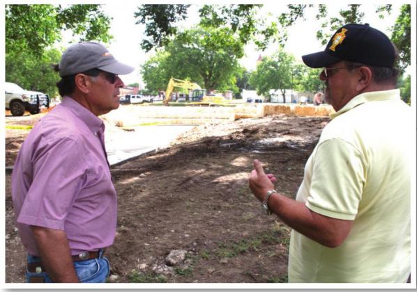Jack Cameron and Ron Rieke, local volunteers working on the amphitheater addition, talk about the project Monday morning at the Meridian Park.