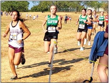 Junior Camy Barsh leads a pack of Lady Cubs follwed by Evy Kennedy and Kyndall Hunt at the Keene Invitational cross country meet last Wednesday. Courtesy Photo