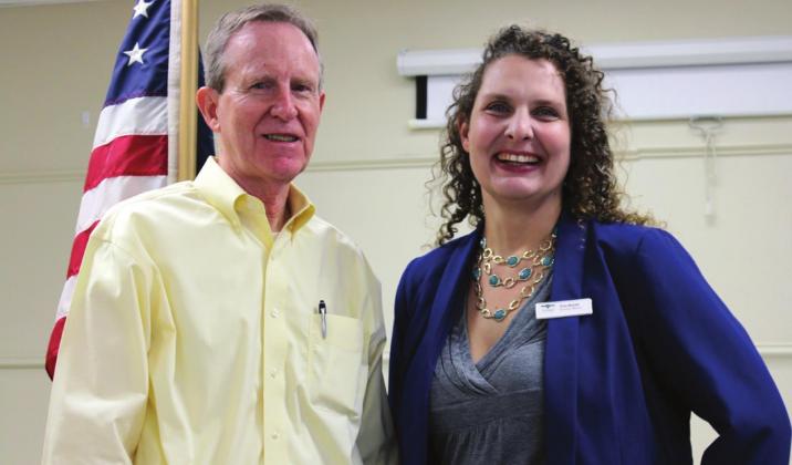From left, Rotarian Rick Lundberg presents Bosque Museum Executive Director Erin Shields at Thursday’s Bosque Rotary Club meeting. Ashley Barner | The Clifton Record