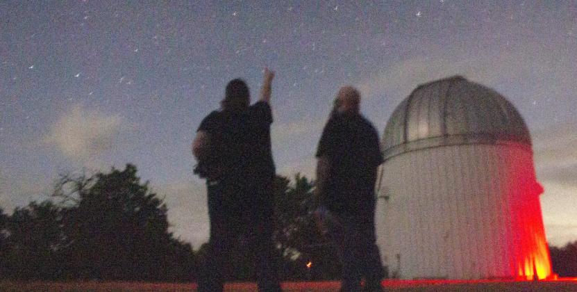 Two locals look at constellations Saturday night at the Meyer Observatory in Bosque County.. Allen D. Fisher | The Clifton Record