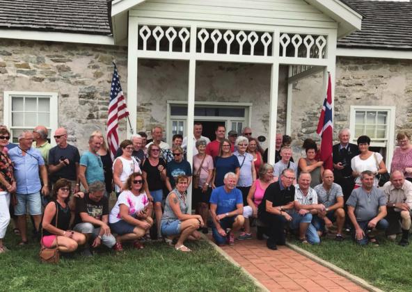 The Ringness House Museum hosts tour groups from all over the world. Above, a tour group from Norway poses for a group photo at the museum. Courtesy Photo