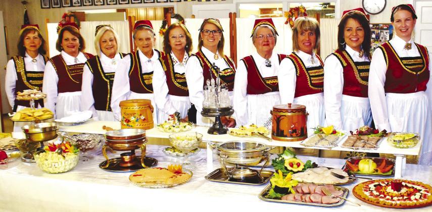 Vaer saa god. Hjelp deg! “Be so good. Help yourself,” is the direct English translation from the traditional Norwegian invitation to the table. The hostesses for the 2023 Norse Smorgasbord welcomed the feast’s hundreds of guests to the lavish all-you-can-eat buffet Saturday evening at Our Savior’s Lutheran Church. Photo Courtesy by Our Savior’s Lutheran Church at Norse