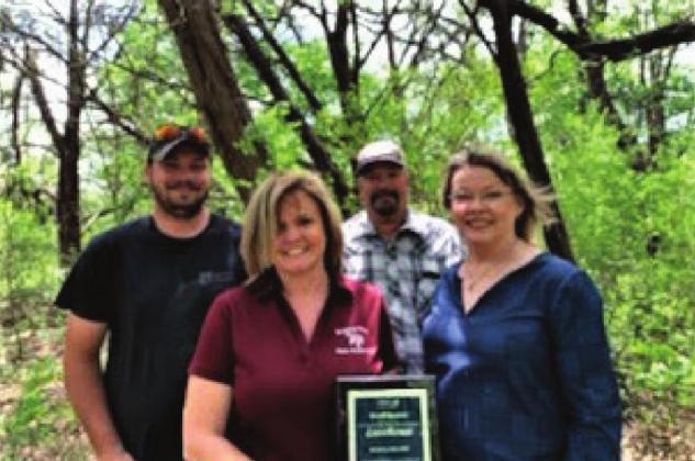 Mustang Valley Water Supply staff members Tyler Murry, Amy Healy, Rodney Murry and Karen Thomasy were recently recognized by the Texas Rural Water Association with the 2021 Small System Excellence Award. Courtesy Photo