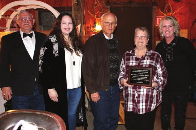 Dr. Richard and Kitsy Spitzer are honored with the Clifton Chamber of Commerce’s Lifetime Achievement Award at the annual Chamber Banquet, held at the Texas Safari Western Town and Saloon. From left is Jerry Golden, Chamber Board Chair Savannah Lea, Dr. (Mayor) Richard and Kitsy Spitzer, and Chamber Director Paige Key. Ashley Barner | The Clifton Record