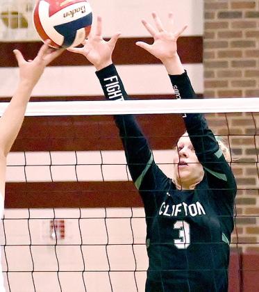 Lady Cub senior Kate Humphreys (9) delivers the serve (top); freshman Brystel Wise (3) blocks at the net (above). Photo courtesy of Brett Voss’ The Sports Buzz