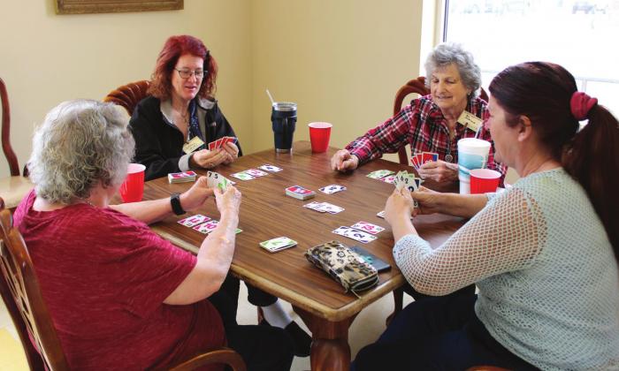 Golden Gathers play Skip-Bo during their first meeting at the Memorial Library and Senior Citizens Center in Meridian last Tuesday. Brook DeZavala | Meridian Tribune