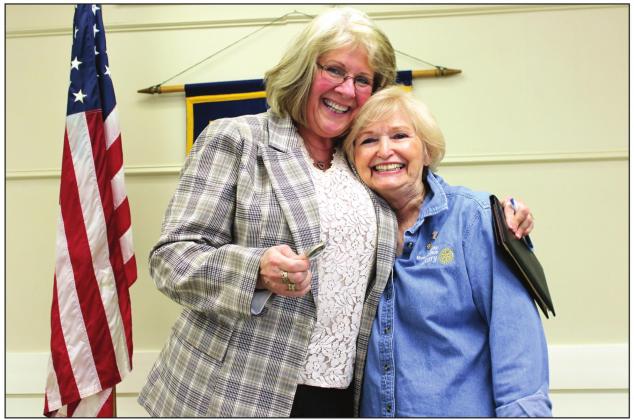 From left, Bosque County Judge Cindy Vanlandingham embraces Bosque Rotary Club President An Thompson after visiting with the Rotary Club last Thursday. Ashley Barner | Meridian Tribune