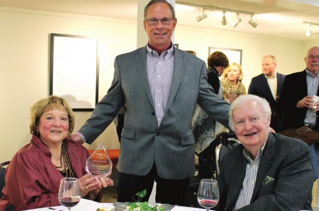 Barbara Aars (left) receives the Bosque Museum Heritage Award, the first time the award has been given since 2003, for her leadership within and commitment to the Bosque Museum. Pictured with Aars is Museum Board of Trustees Past-President Tom Henderson (middle) and her husband Gene (right). Ashley Barner | The Clifton Record